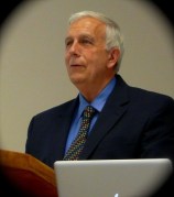 A Facilitator discussing the Tutorial presentation.